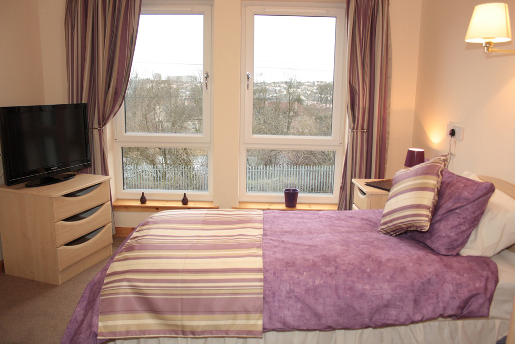 purple decorated bedroom