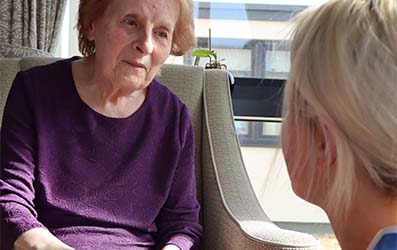 Resident Chatting to Carer