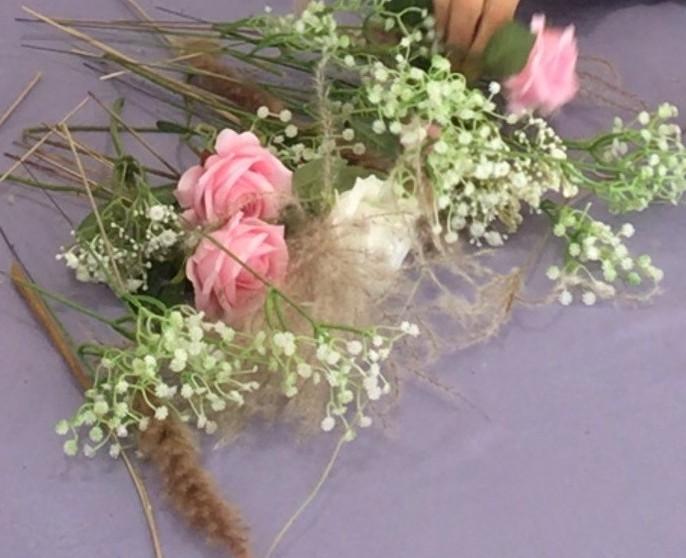 pink and white roses on lilac table